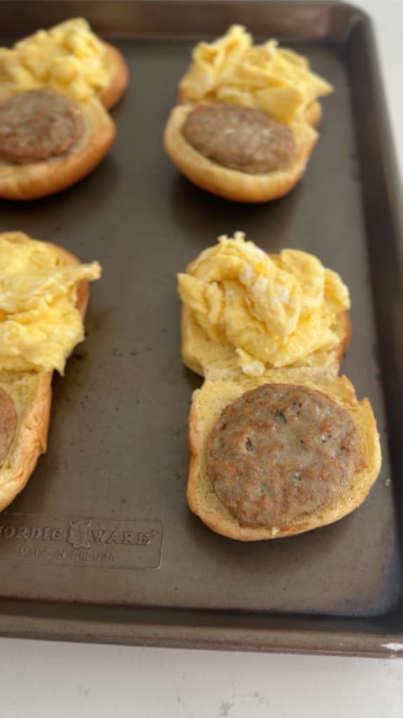 Sausage Egg Breakfast Sandwich — Soft brioche buns loaded with sizzling sausage patties and fluffy scrambled eggs. Assemble…